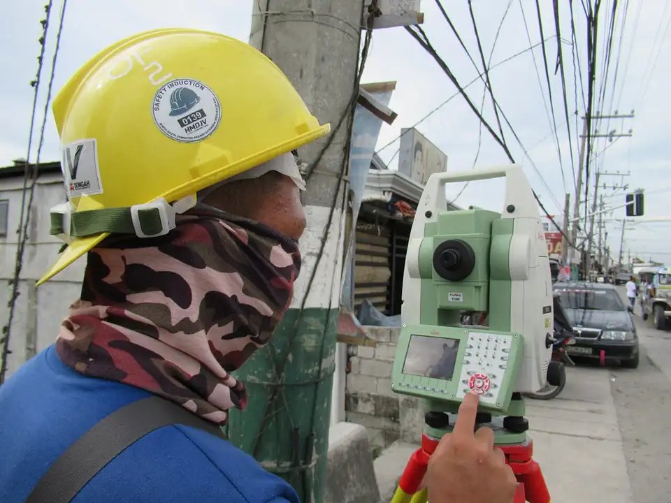 Site engineer working with a field instrument